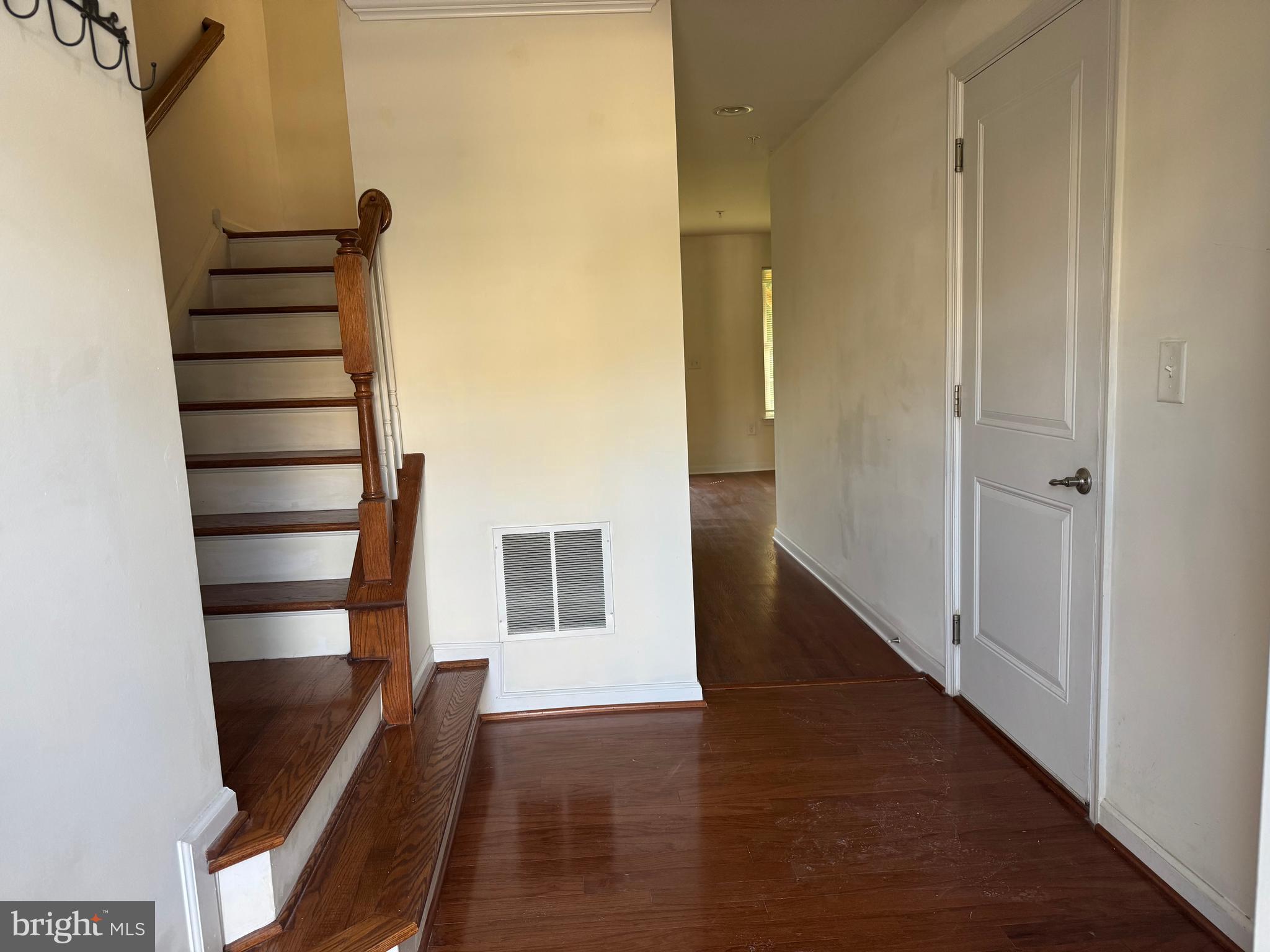 814 Susan Circle North Wales, PA 19454 - Photo 4 of 39 a view of a hallway with wooden floor and windows