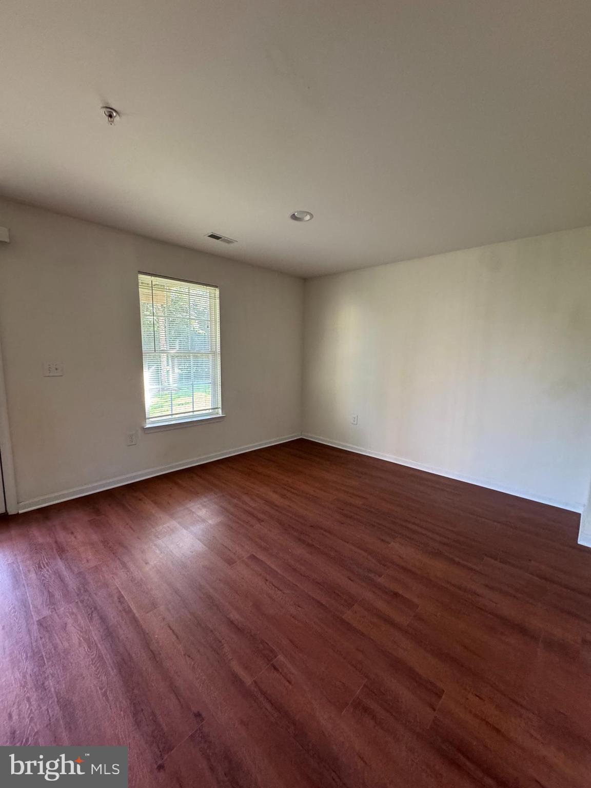 814 Susan Circle North Wales, PA 19454 - Photo 5 of 39 an empty room with wooden floor and windows