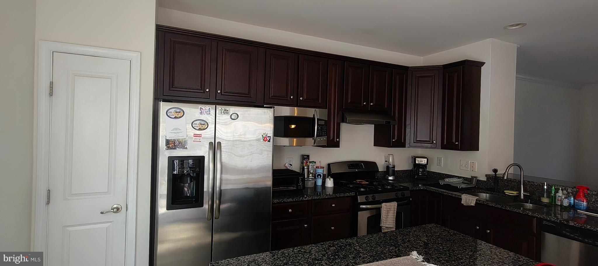 814 Susan Circle North Wales, PA 19454 - Photo 9 of 39 a kitchen with stainless steel appliances granite countertop a refrigerator and a stove top oven