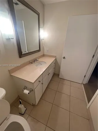 a view of dining room with furniture and clutter