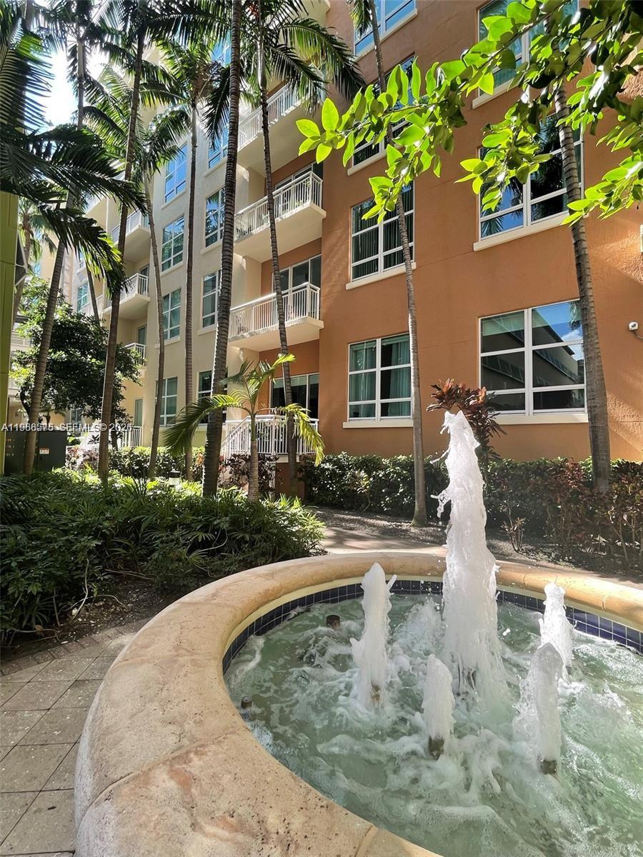 2001 Biscayne Boulevard, Unit 2217 Miami, FL 33137 - Photo 19 of 27 front view of a house with a yard