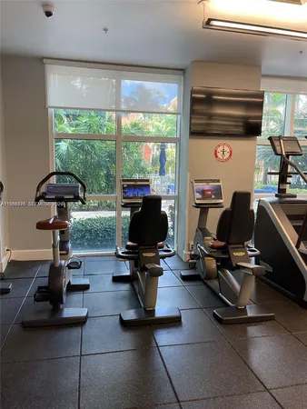 a view of a room with gym equipment