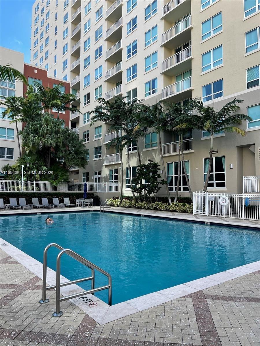 2001 Biscayne Boulevard, Unit 2217 Miami, FL 33137 - Photo 24 of 27 a front view of a building with outdoor seating