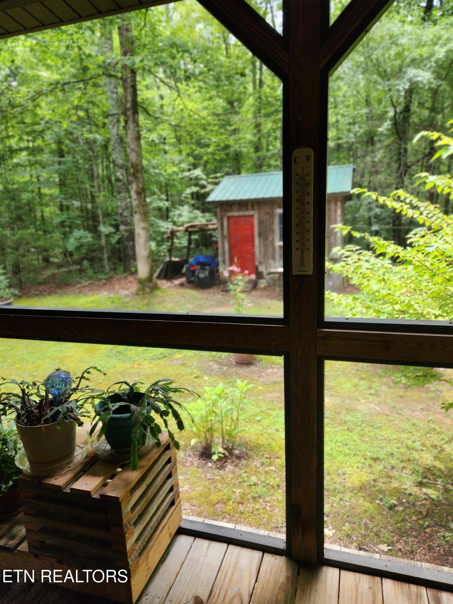 108 Gold Miners Road Tellico Plains, TN 37385 - Photo 11 of 35 From screened porch