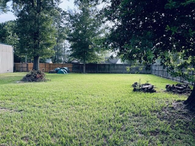 802 Fall Creek Drive Huffman, TX 77336 - Photo 7 of 17 a view of a backyard with swimming pool