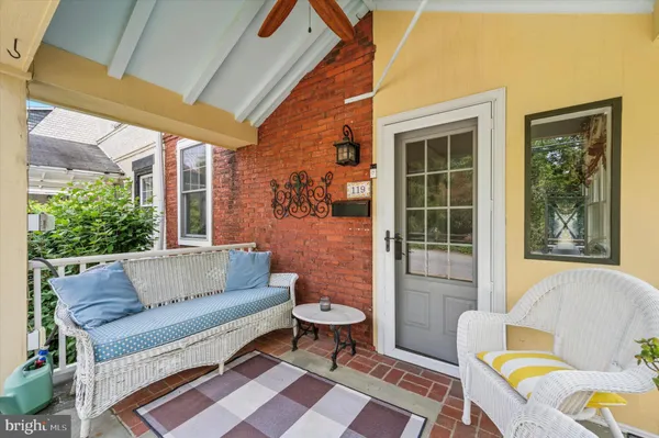 a outdoor living space with furniture and a window