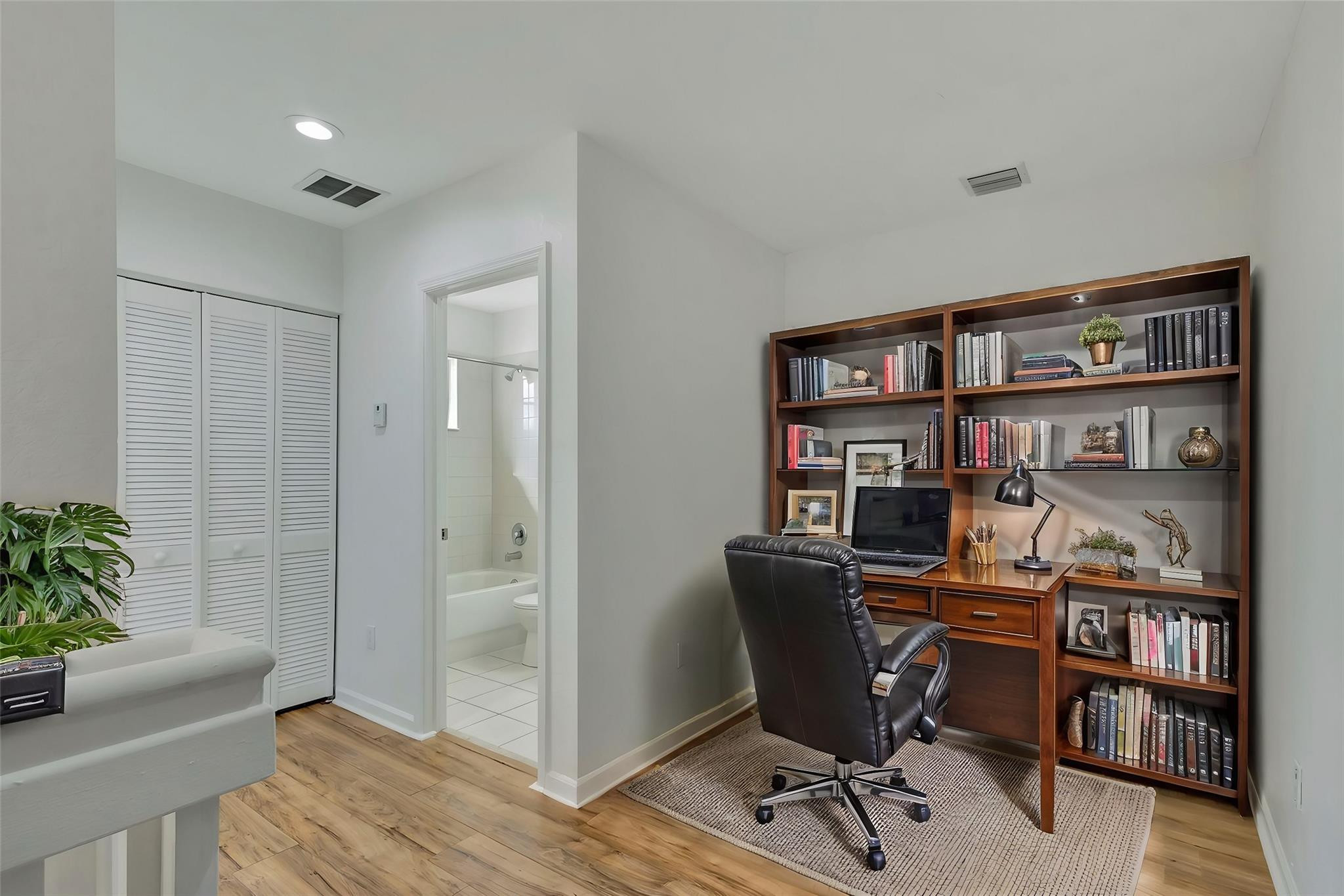 1000 Flamingo Place Riviera Beach, FL 33404 - Photo 38 of 83 a view of a workspace with furniture and cabinet