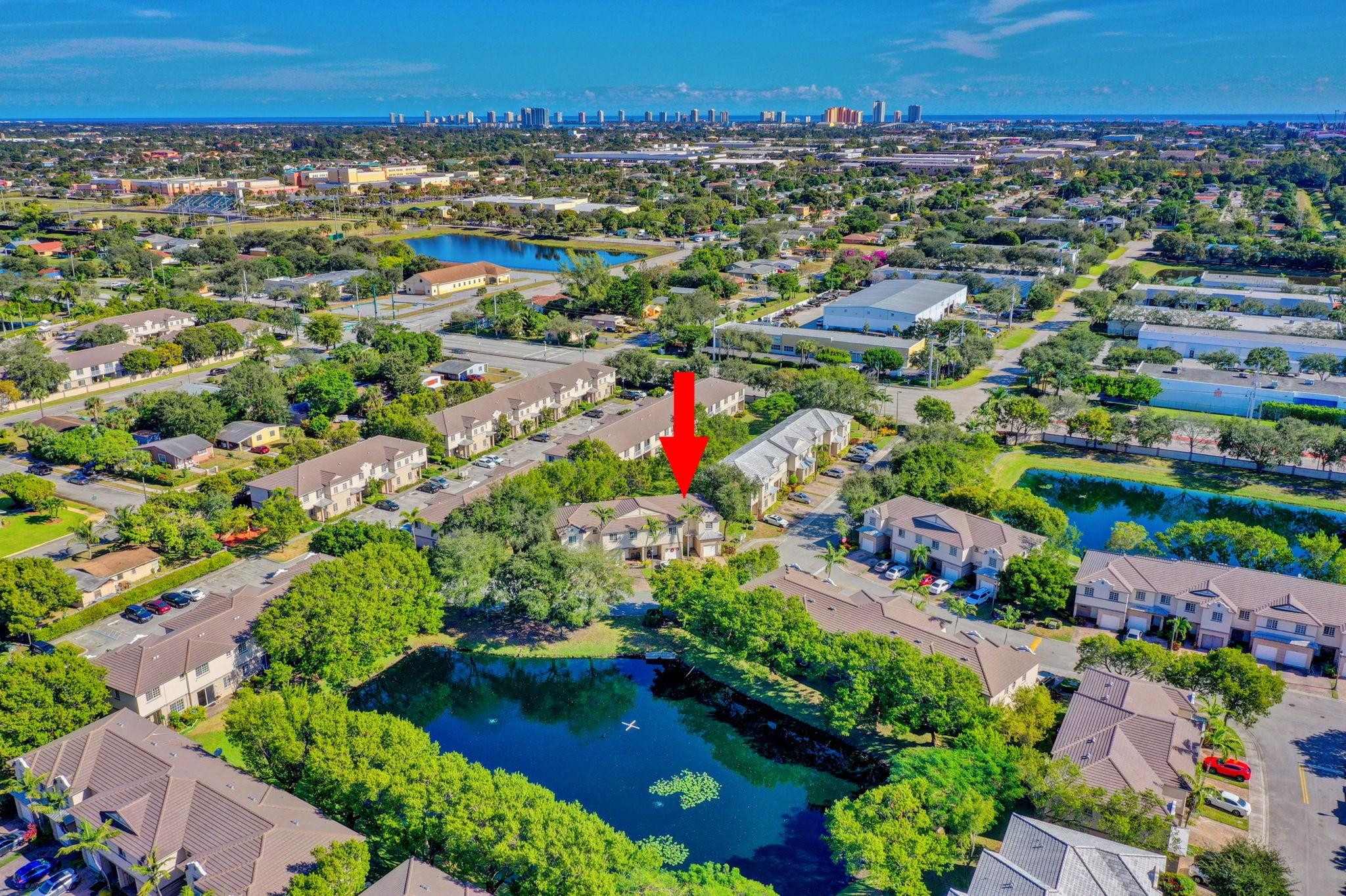 1000 Flamingo Place Riviera Beach, FL 33404 - Photo 43 of 83 an aerial view of residential houses with outdoor space and street view