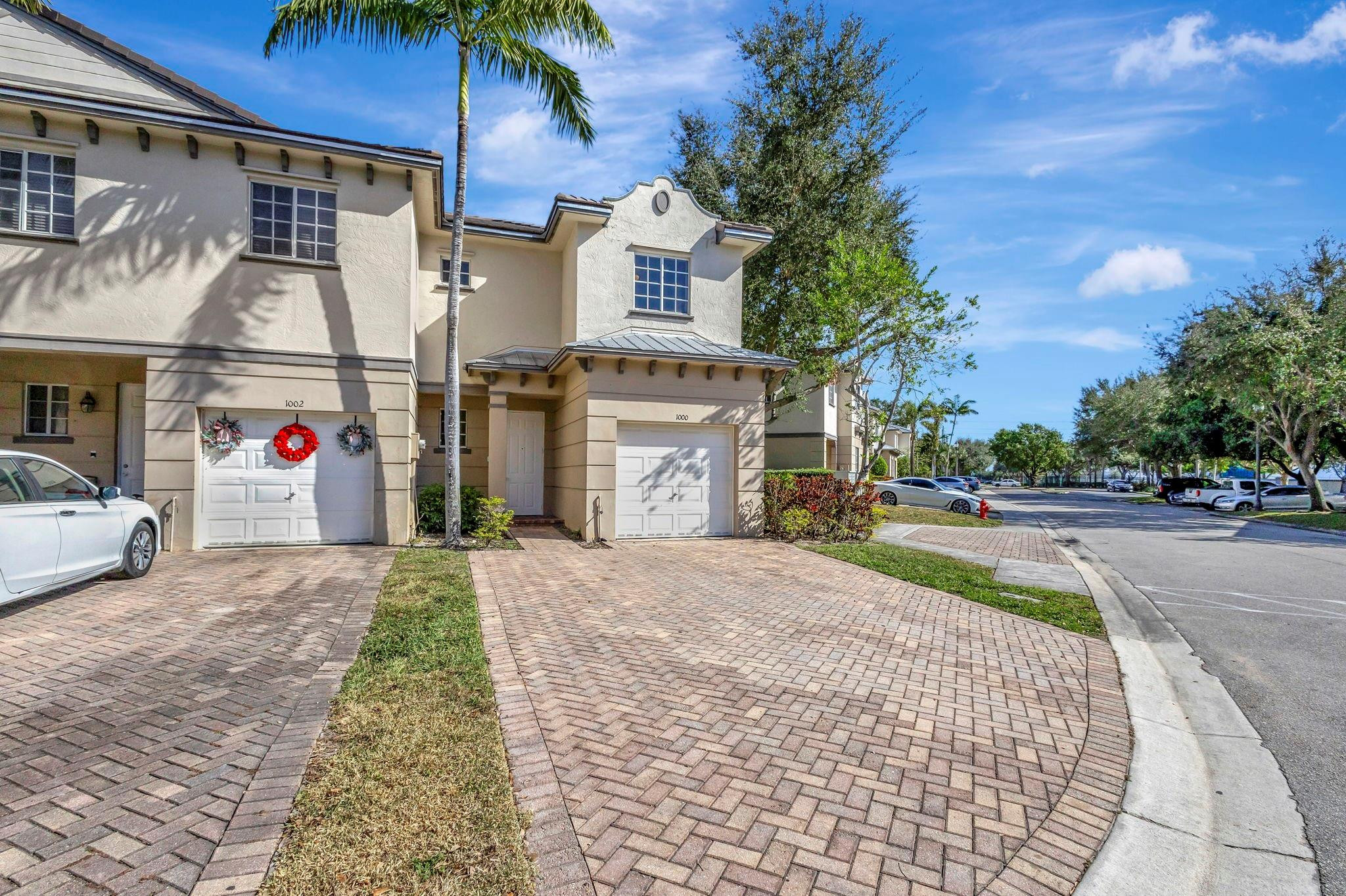 1000 Flamingo Place Riviera Beach, FL 33404 - Photo 76 of 83 a front view of a building with garden
