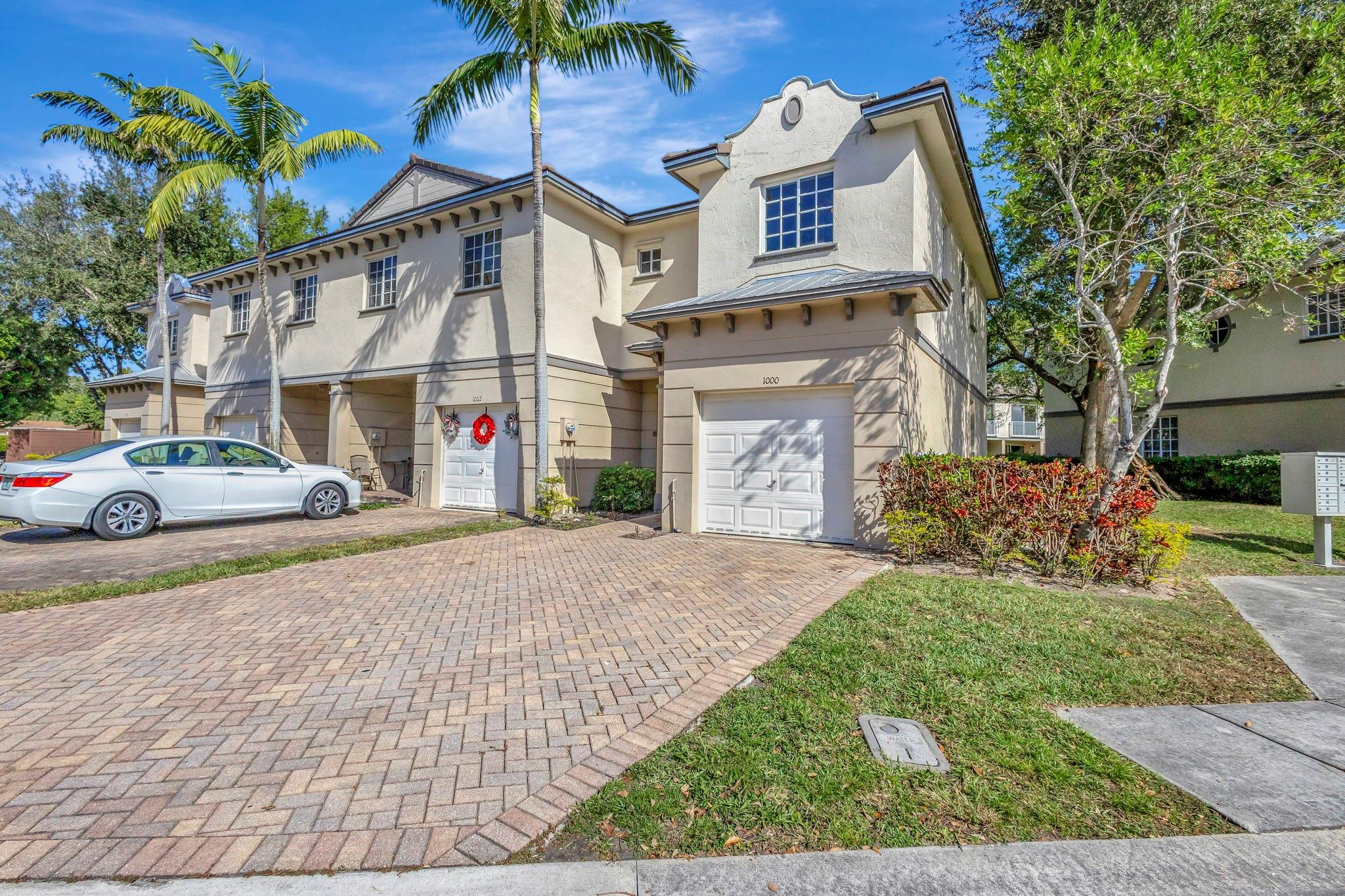 1000 Flamingo Place Riviera Beach, FL 33404 - Photo 77 of 83 a view of multiple houses with a yard and potted plants