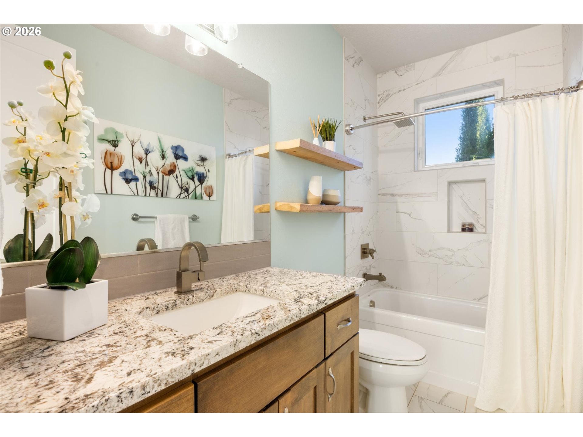 199 Southwest Alder Street Dundee, OR 97115 - Photo 23 of 48 a bathroom with a granite countertop sink a toilet and shower