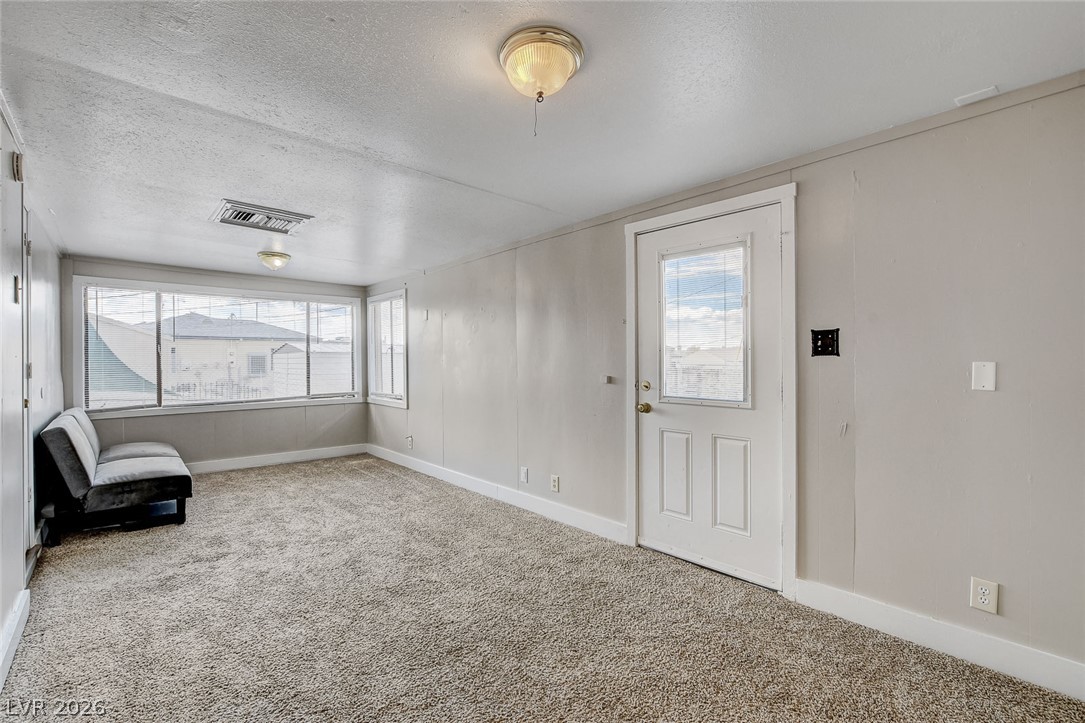 214 West Victory Road Henderson, NV 89015 - Photo 22 of 33 A well-lit, adaptable room offering a blank canvas for personalization.