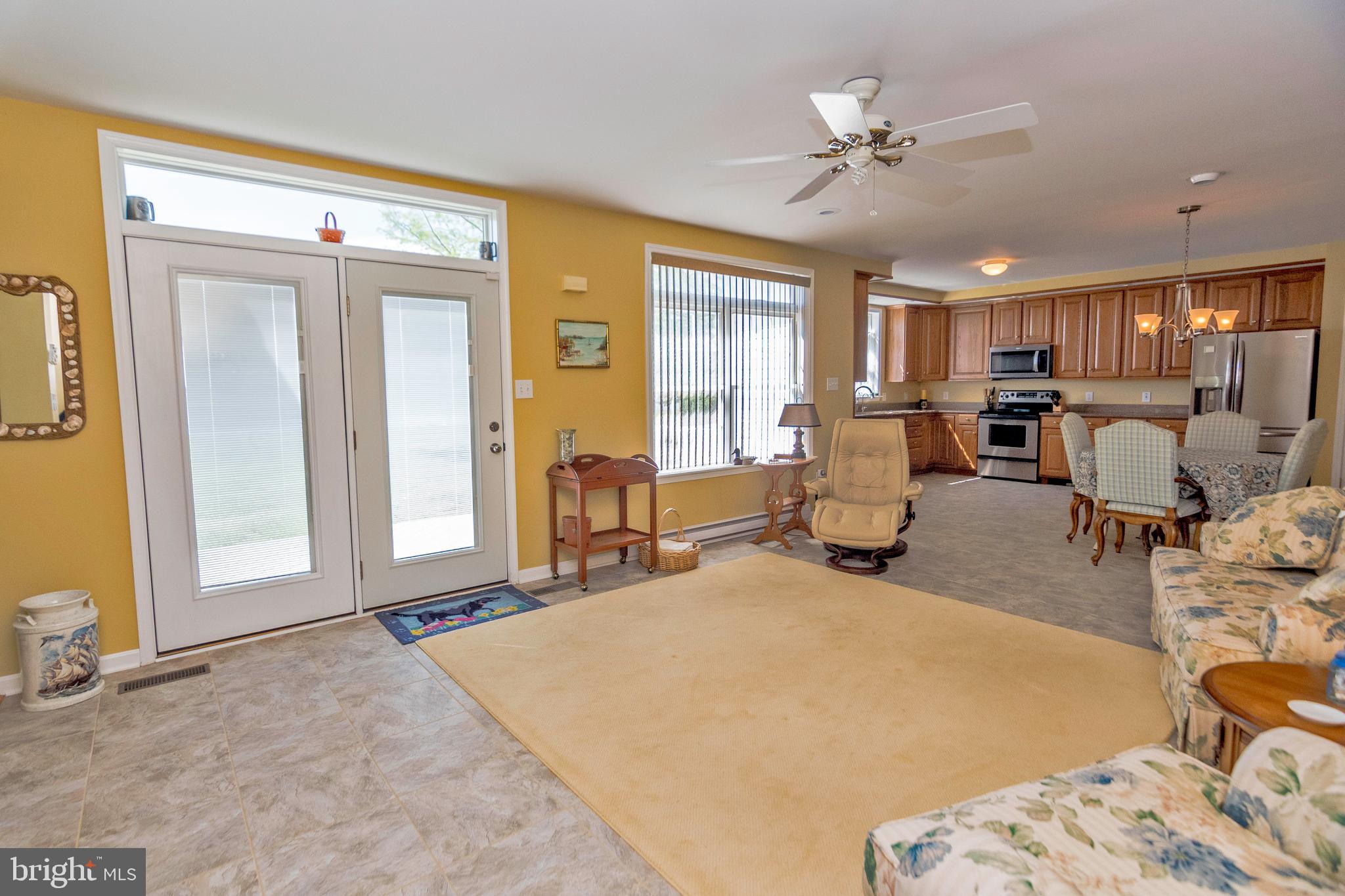 3273 Williams Point Road Marion Station, MD 21838 - Photo 12 of 61 a living room with furniture and white walls