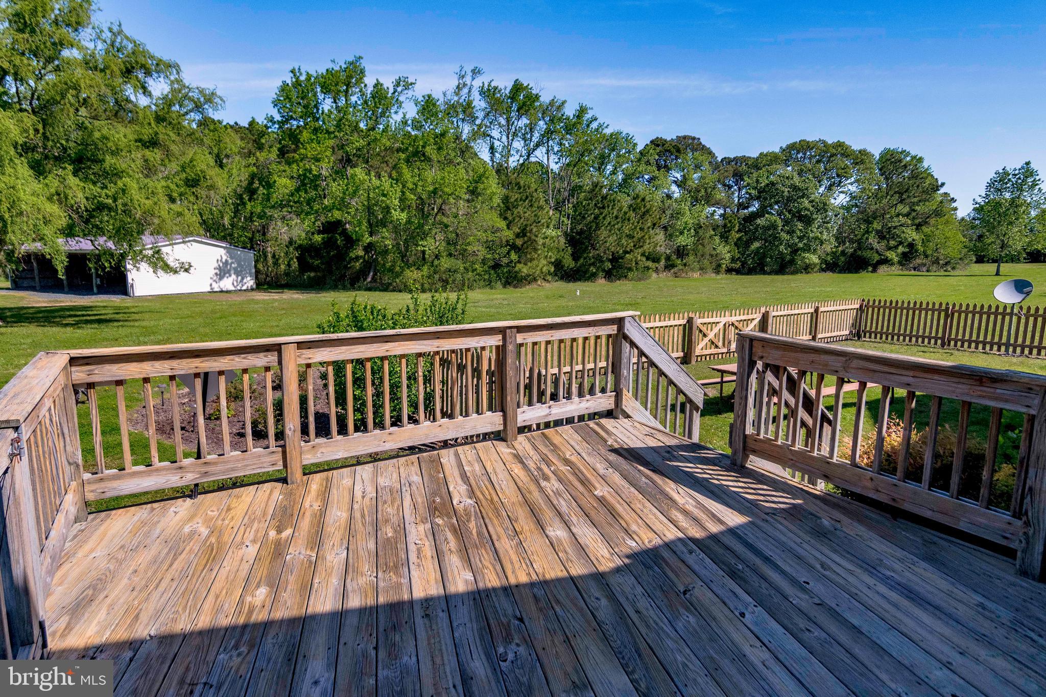 3273 Williams Point Road Marion Station, MD 21838 - Photo 60 of 61 a view of wooden deck with a yard