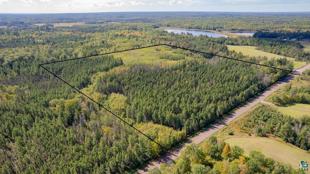 74-xxx South Hallberg Road Lake Nebagamon, WI 54849 - Photo 2 of 5 Drone / aerial view with a water view