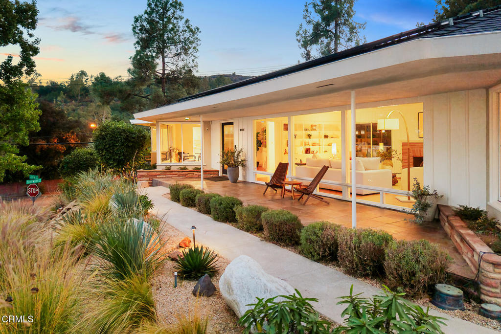 1620 Knollwood Drive Pasadena, CA 91103 - Photo 1 of 59 a view of a swimming pool with outdoor seating