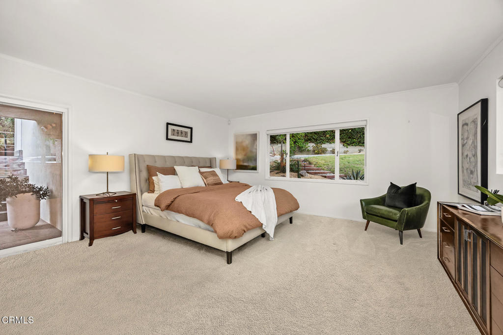 1620 Knollwood Drive Pasadena, CA 91103 - Photo 14 of 59 a bedroom with a bed and a couch