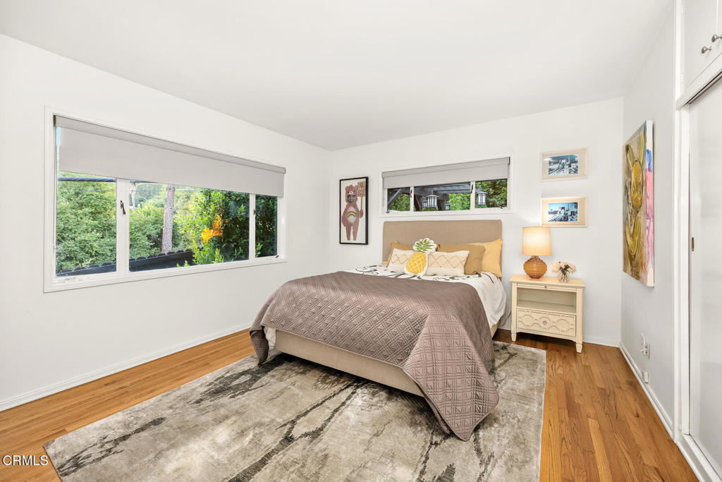 1620 Knollwood Drive Pasadena, CA 91103 - Photo 27 of 59 a bedroom with a bed and a window