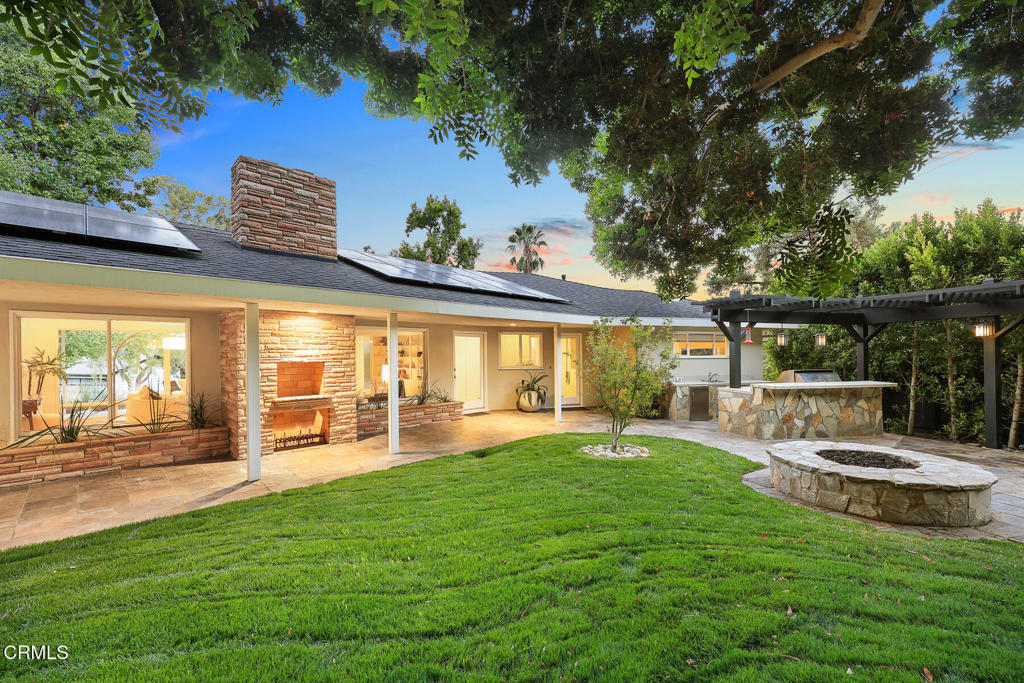 1620 Knollwood Drive Pasadena, CA 91103 - Photo 29 of 59 swimming pool with wooden fence and large trees