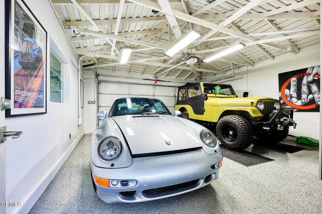 1620 Knollwood Drive Pasadena, CA 91103 - Photo 32 of 59 a car that is parked in a garage