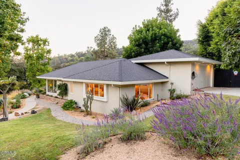 a view of swimming pool with patio