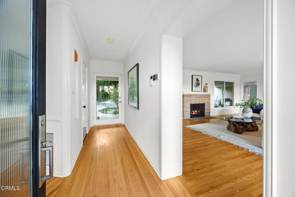 1620 Knollwood Drive Pasadena, CA 91103 - Photo 7 of 59 a view of a livingroom with furniture and a fireplace