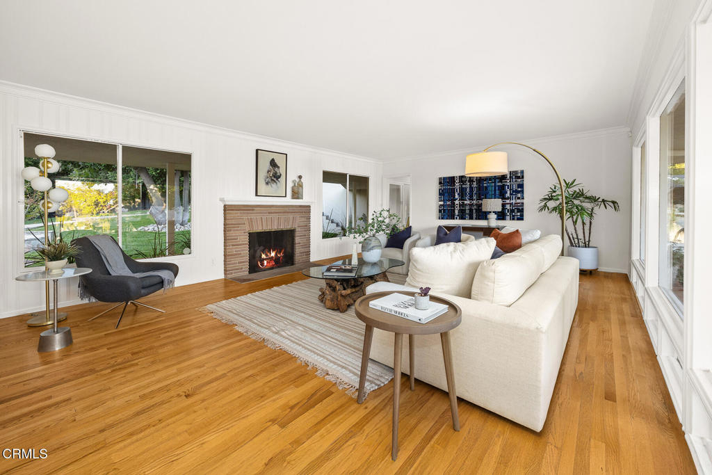 1620 Knollwood Drive Pasadena, CA 91103 - Photo 9 of 59 a living room with furniture and a fireplace