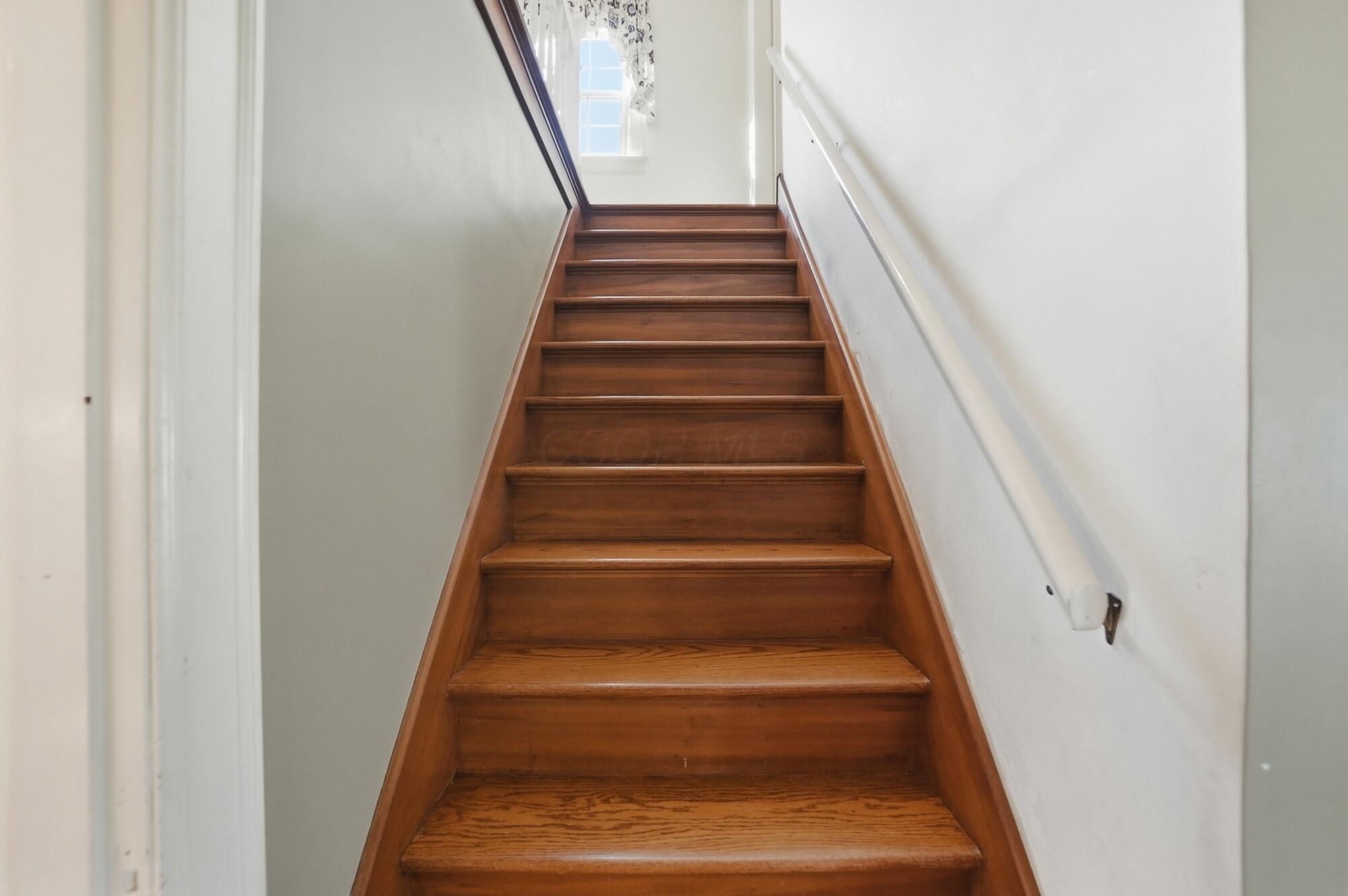 1627 Doone Road Upper Arlington, OH 43221 - Photo 28 of 37 Refinished steps to the 2nd floor.