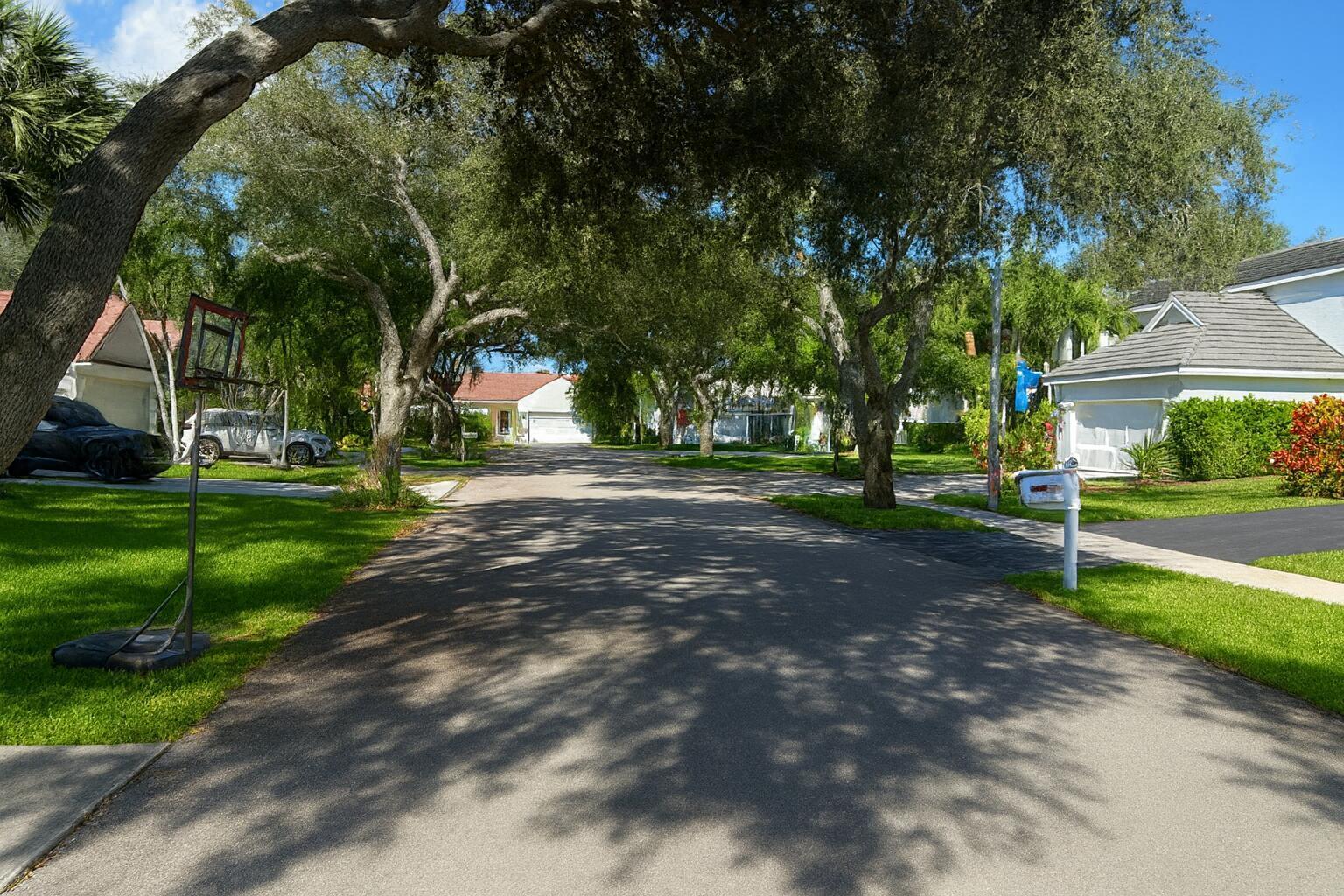 1710 Park Tree Place Delray Beach, FL 33445 - Photo 2 of 3 a view of a park with large trees