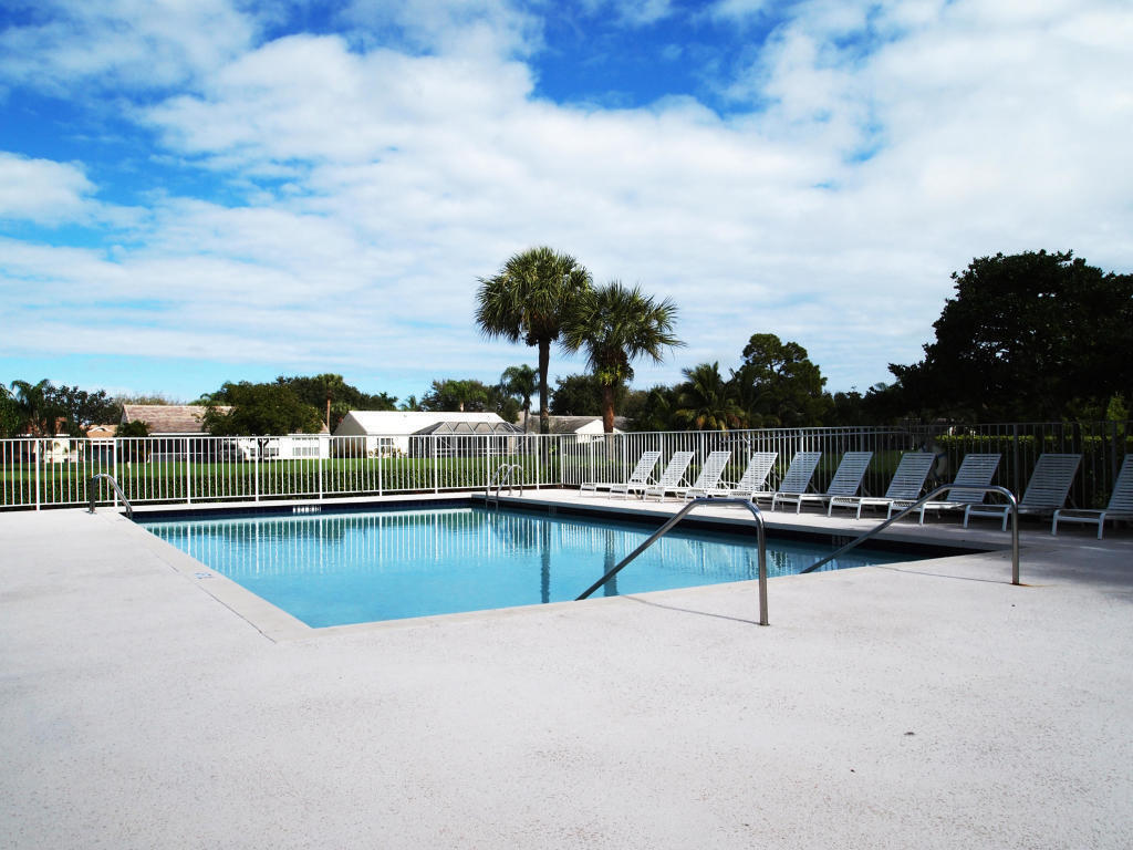 1710 Park Tree Place Delray Beach, FL 33445 - Photo 3 of 3 a view of swimming pool with outdoor seating