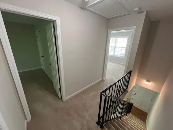 an entryway with a staircase