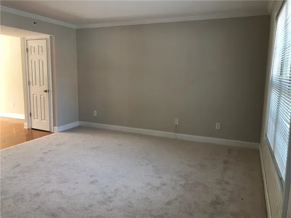 an empty room with windows