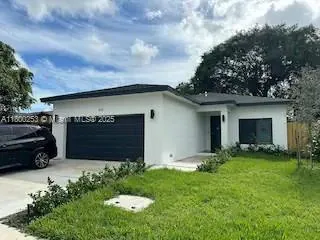 a house view with a garden space