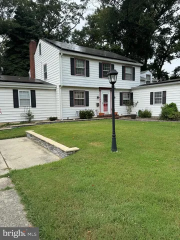 a view of a house with a swimming pool