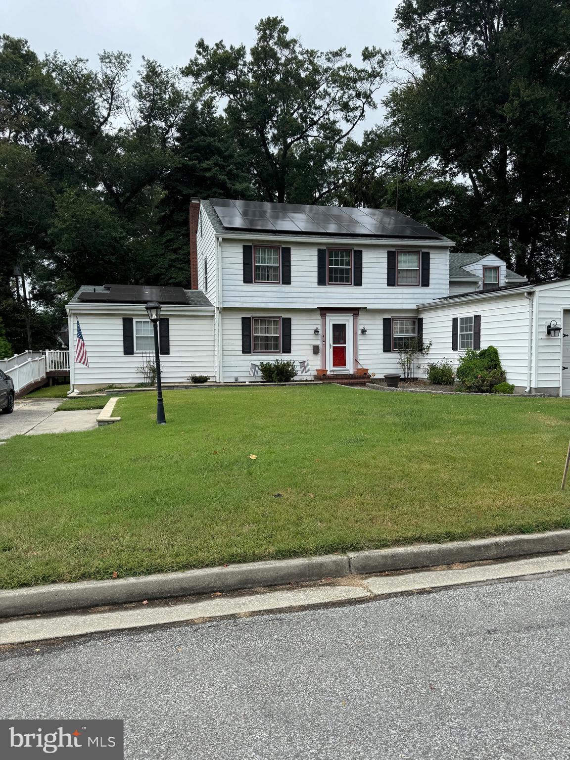 4 Grove Street Carneys Point, NJ 08069 - Photo 3 of 6 a view of a house with a yard deck and sitting area