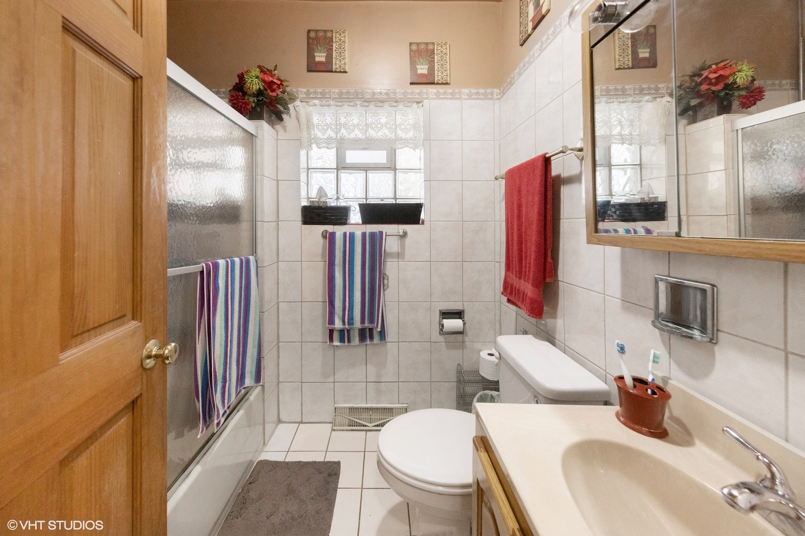 4904 West Deming Place Chicago, IL 60639 - Photo 6 of 15 a bathroom with a sink toilet and shower