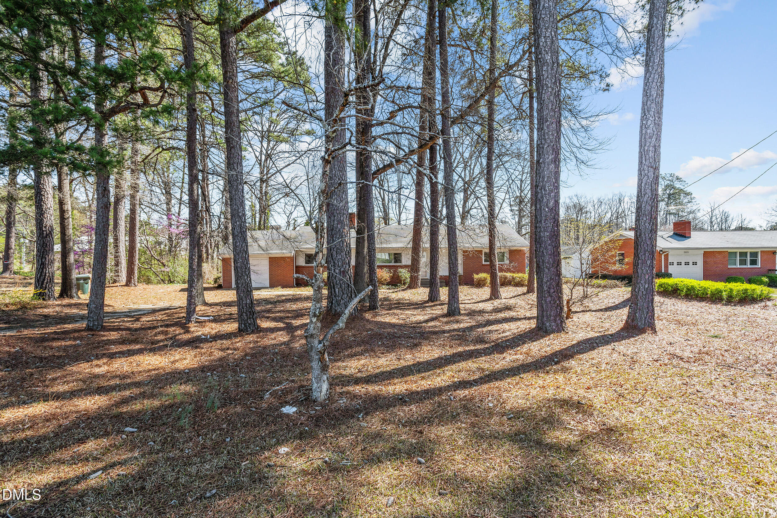5011 Old Stage Road Raleigh, NC 27603 - Photo 4 of 29 a view of a yard with a tree