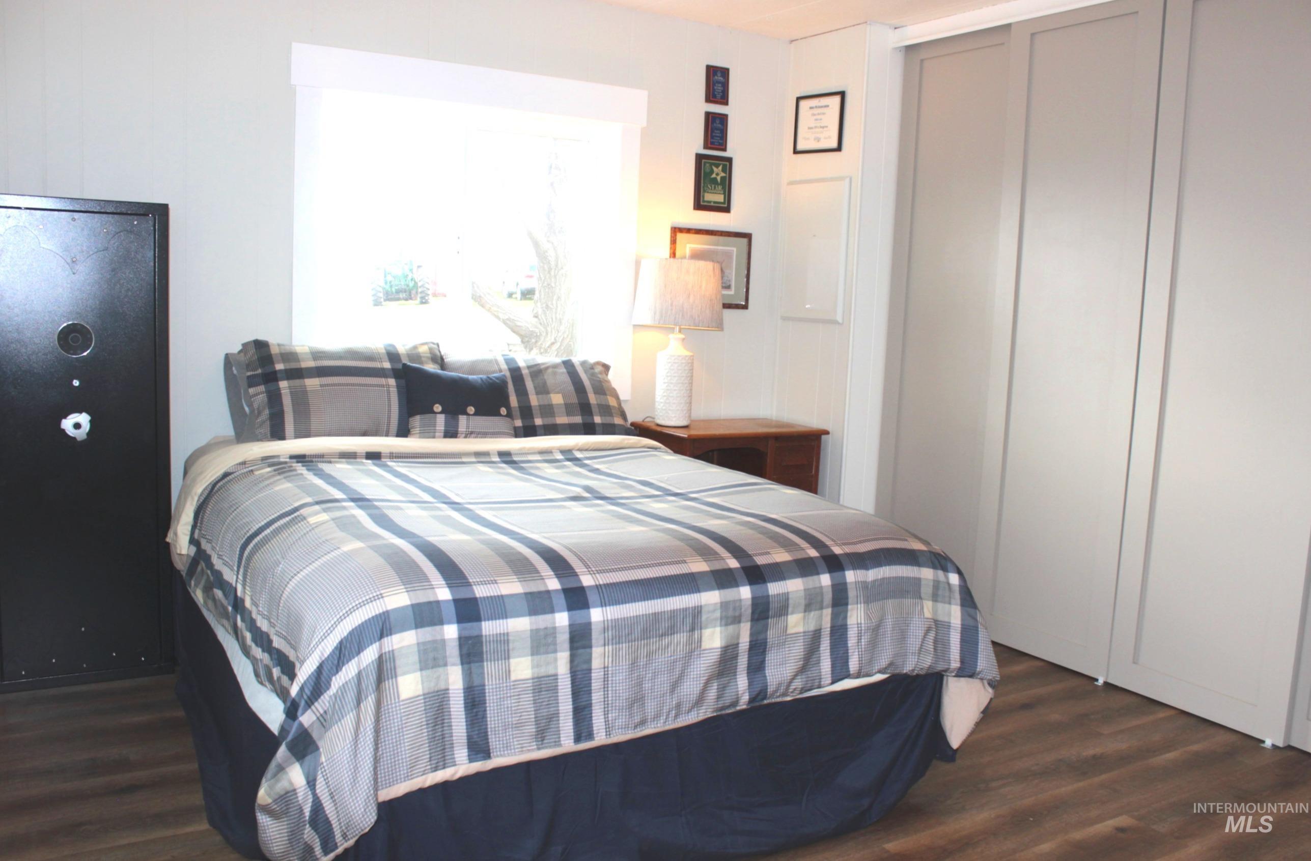 1824 Dutch Flat Road Midvale, ID 83645 - Photo 23 of 41 Bedroom with dark wood-style floors and a closet
