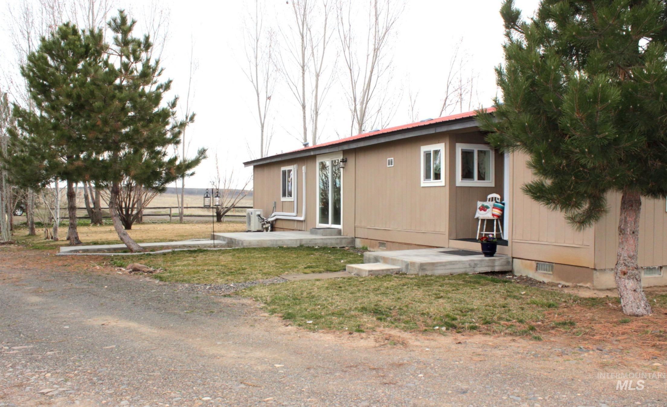 1824 Dutch Flat Road Midvale, ID 83645 - Photo 28 of 41 View of back of house featuring crawl space and a front yard