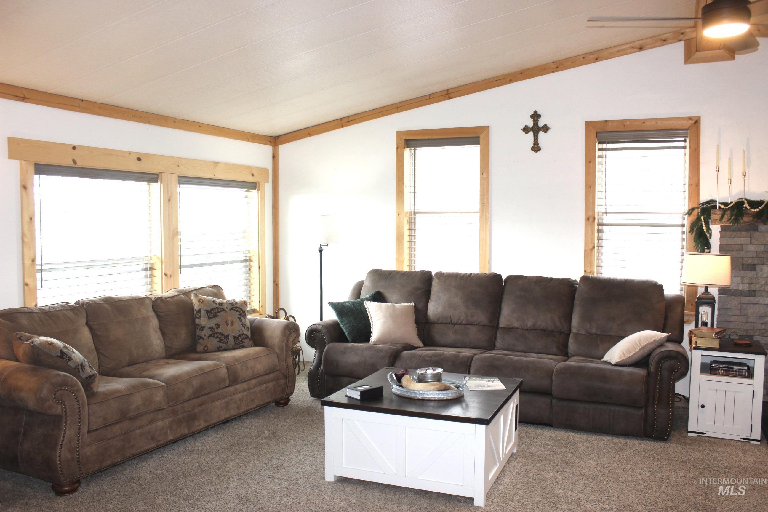 1824 Dutch Flat Road Midvale, ID 83645 - Photo 5 of 41 Carpeted living room featuring vaulted ceiling