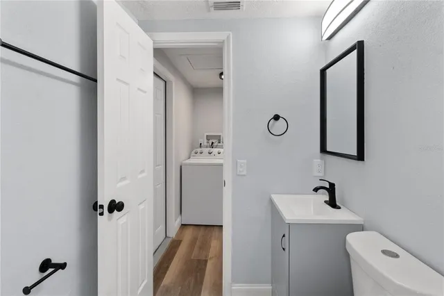 an aerial view of a house with swimming pool