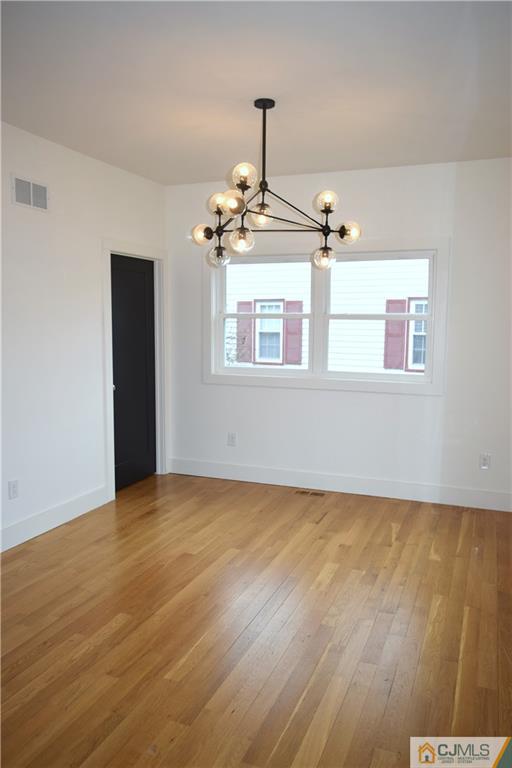 13 Cherokee Road Cranford, NJ 07016 - Photo 3 of 25 a view of a room with wooden floor