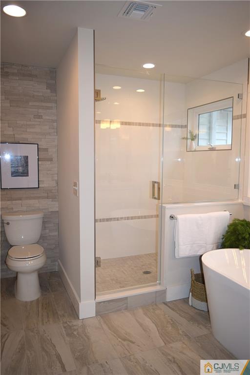 13 Cherokee Road Cranford, NJ 07016 - Photo 22 of 25 a bathroom with a toilet and a shower