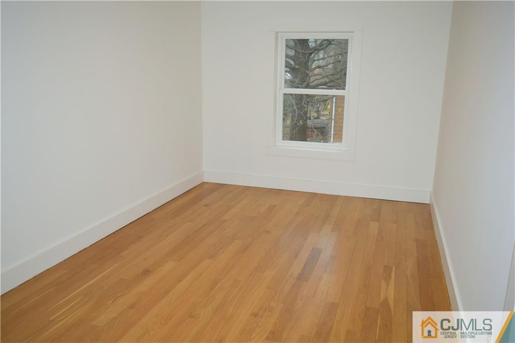 13 Cherokee Road Cranford, NJ 07016 - Photo 25 of 25 an empty room with a window