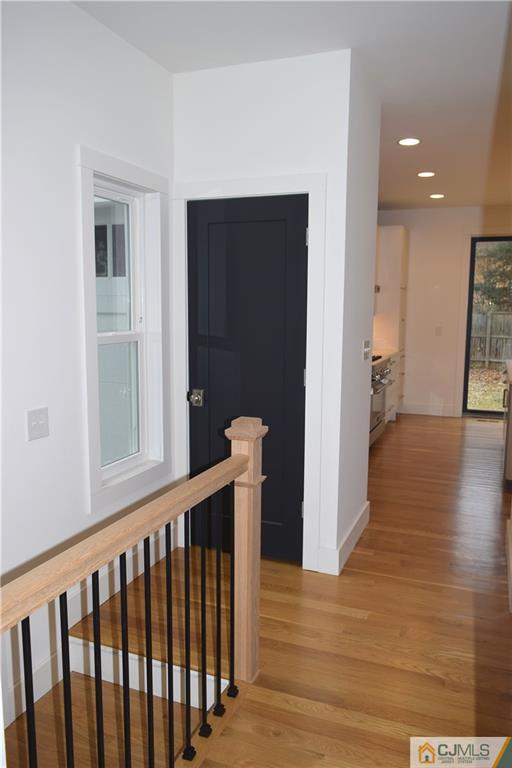 13 Cherokee Road Cranford, NJ 07016 - Photo 8 of 25 a view of hallway with wooden floor