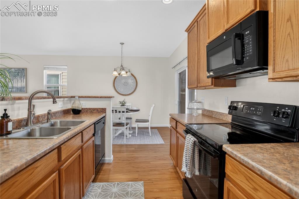7682 Capel Point Peyton, CO 80831 - Photo 5 of 24 Galley kitchen