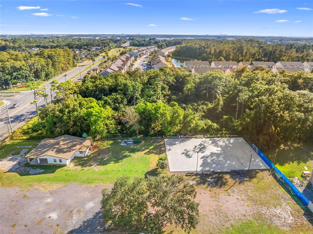 4170 South Goldenrod Road Orlando, FL 32822 - Photo 20 of 21 a view of a city with mountains in the background