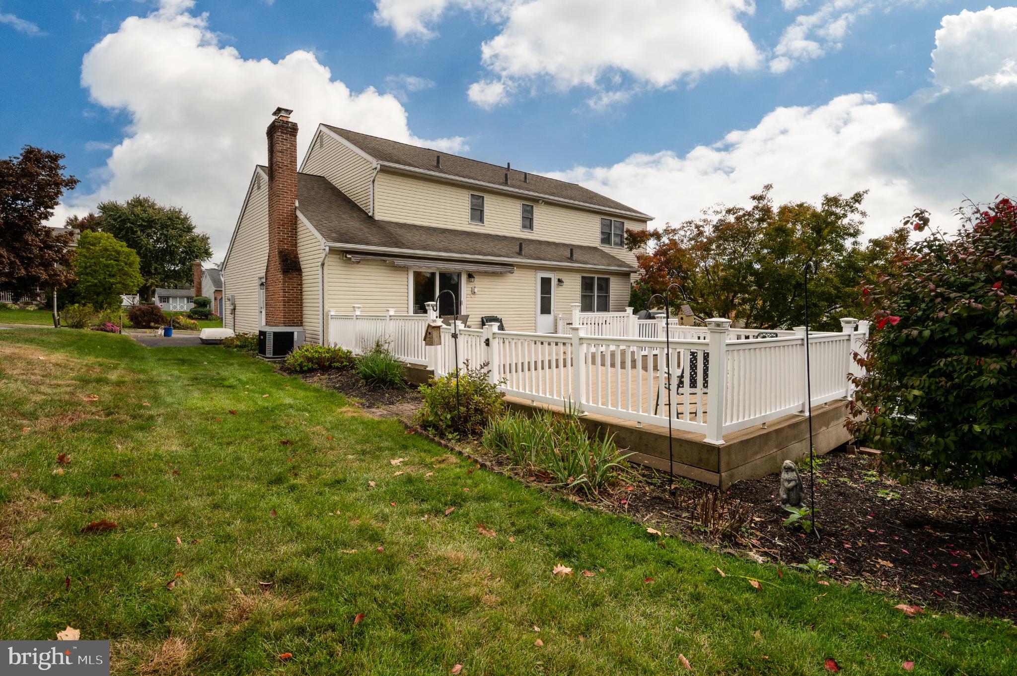 1052 Boeshore Circle Reading, PA 19605 - Photo 14 of 72 a view of a house with a yard and deck