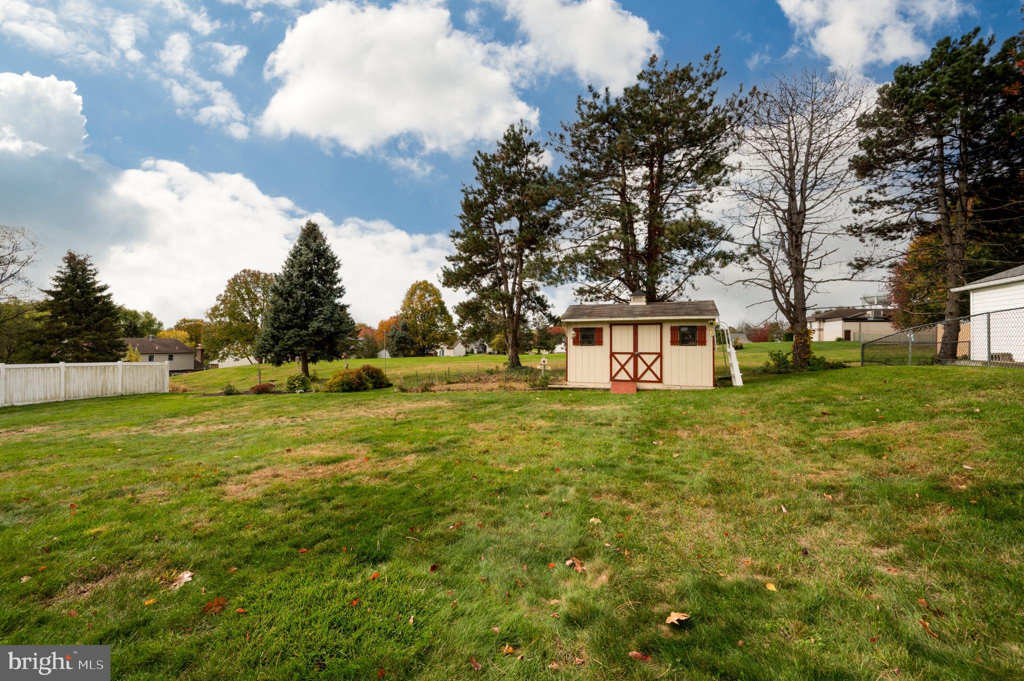1052 Boeshore Circle Reading, PA 19605 - Photo 20 of 72 a view of a big yard with large trees