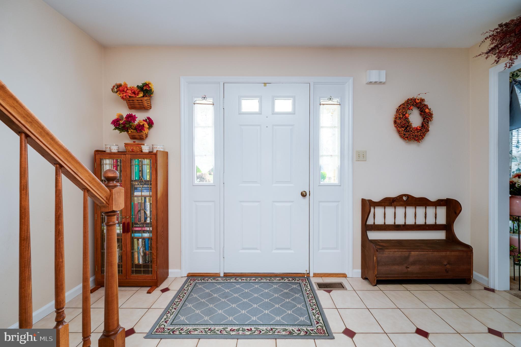 1052 Boeshore Circle Reading, PA 19605 - Photo 22 of 72 a living room with furniture and a rug